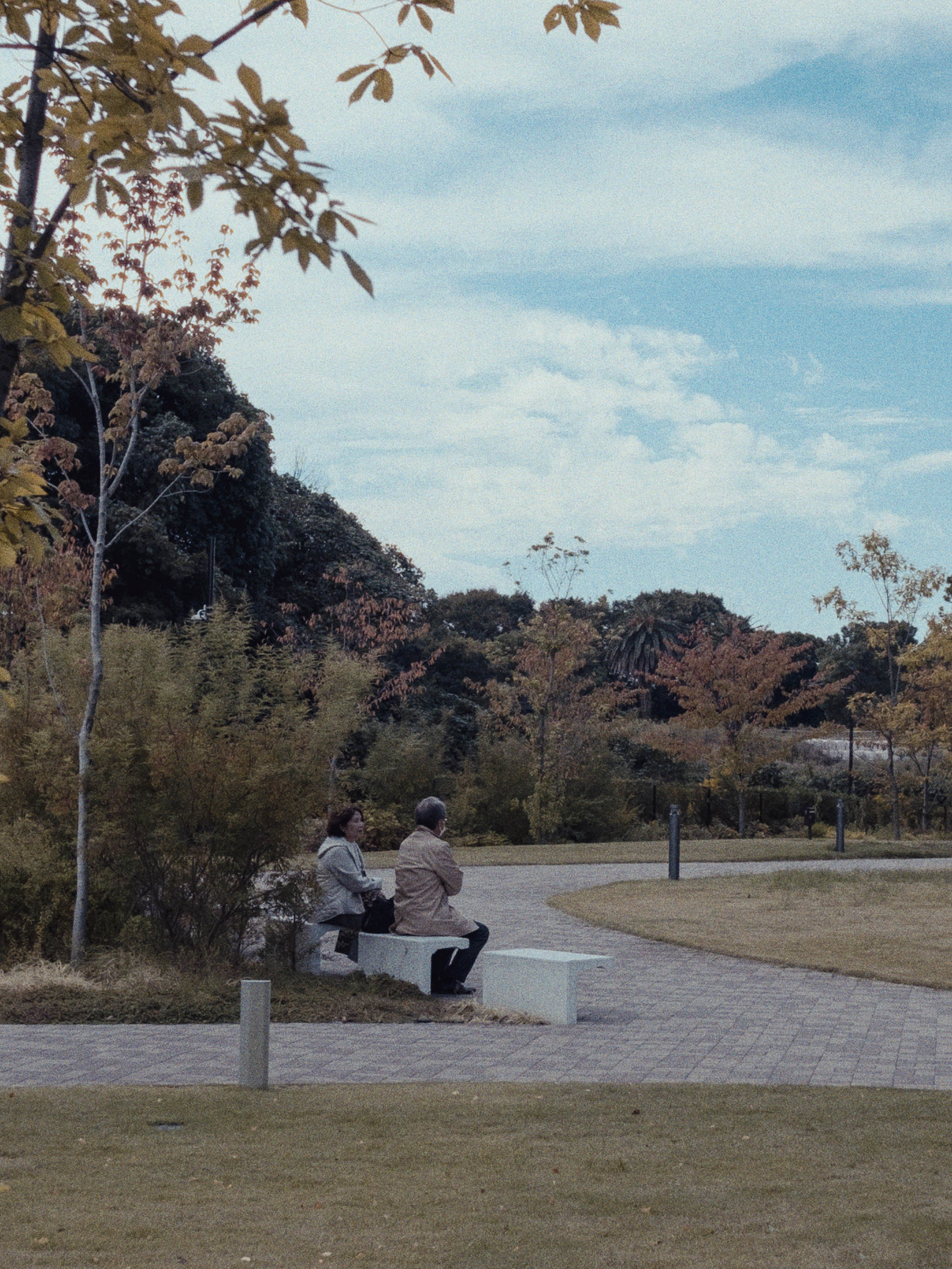 a person standing in front of a rock formation