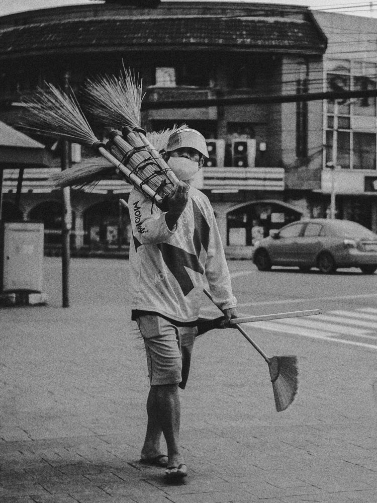 a person standing in front of a rock formation