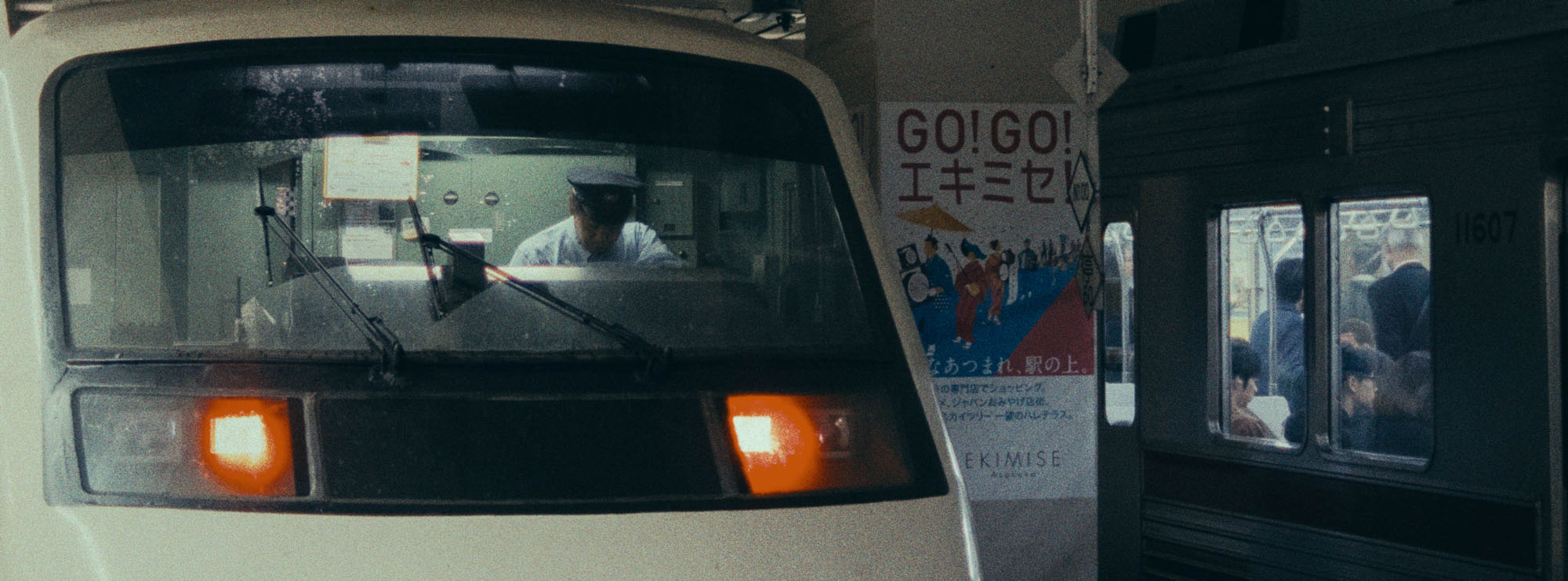 a person standing in front of a rock formation