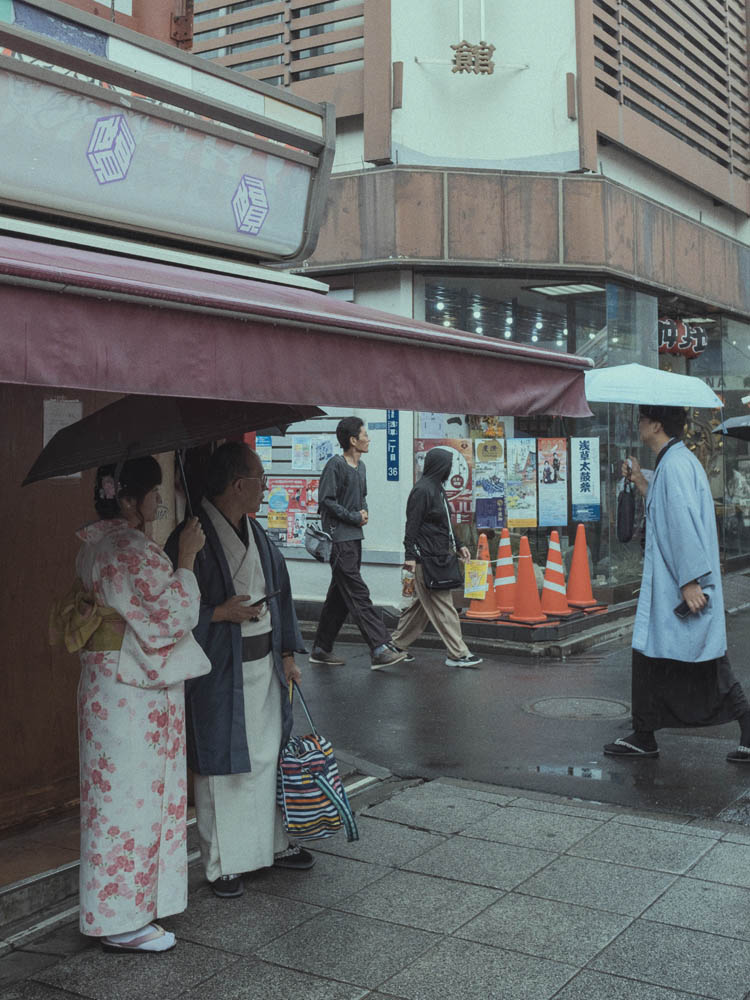 a person standing in front of a rock formation